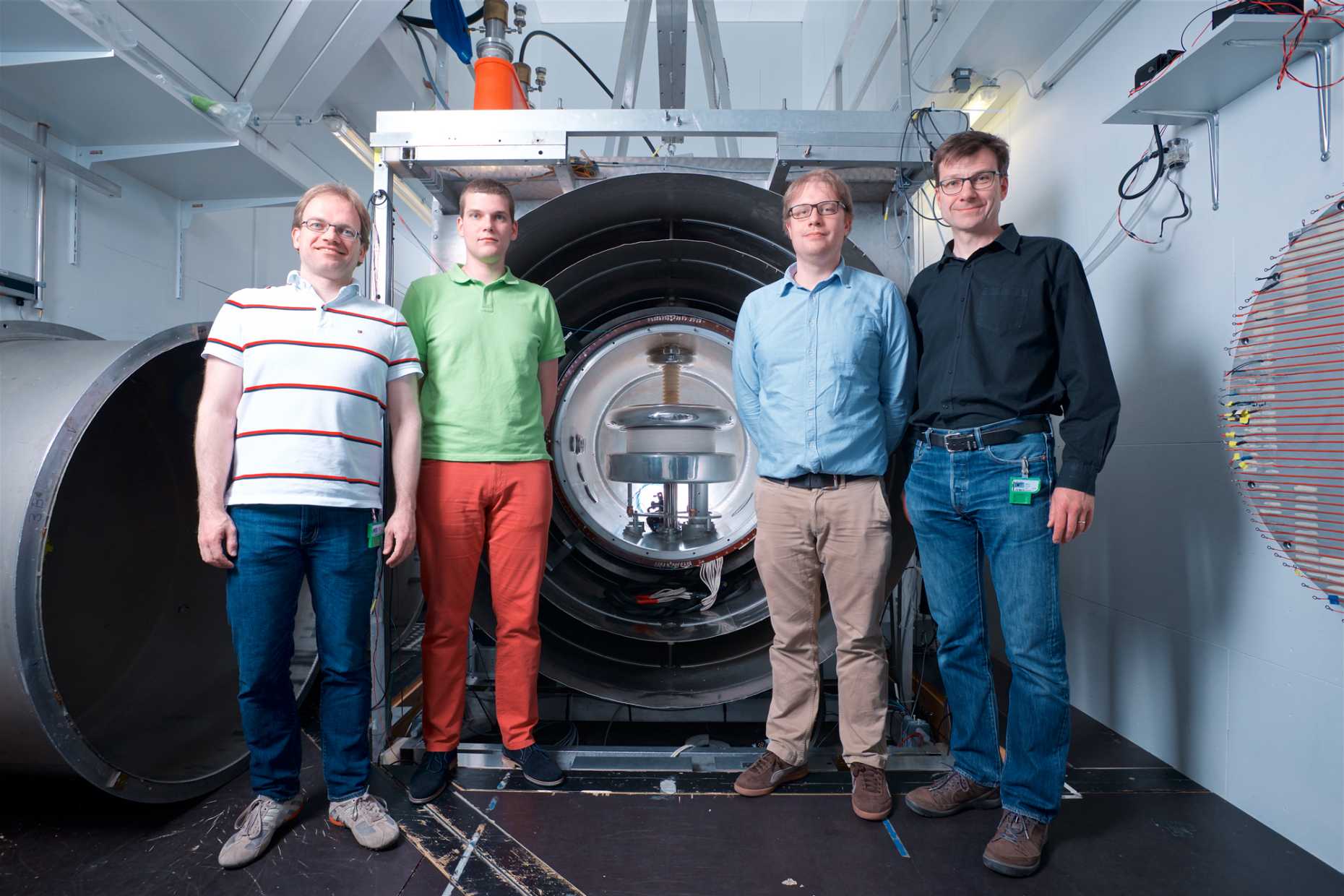 Members from ETH in front of the nEDM apparatus at PSI: (f.l.t.r) Jochen Krempel, Michal Rawlik, Florian Piegsa and Klaus Kirch.