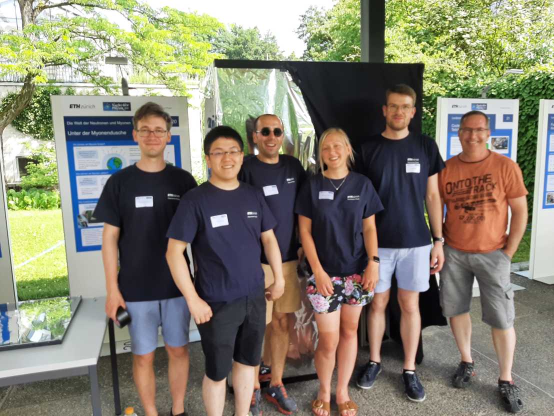 Part of our group at the infront of our stand at "Nacht der Physik 2022"